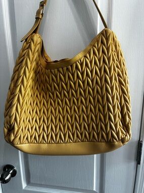 Butter yellow Tote with a matching pouch/ purse NWOT
